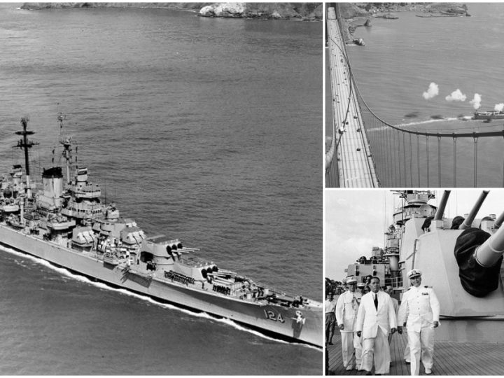 USS Rochester (CA 124) Fires Gun Salute While Entering San Francisco Bay, Viewed from Golden Gate Bridge